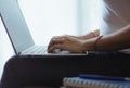 Businesswoman working or using laptop or computer for e-business at home. Student reading, learning and studying online webinar Royalty Free Stock Photo