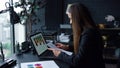 Businesswoman working at workplace with documents. Woman thinking about project Royalty Free Stock Photo