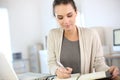 Businesswoman writing in agenda Royalty Free Stock Photo