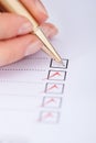 Businesswoman Writing On Checklist Royalty Free Stock Photo