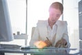 Businesswoman writing on diary on desk Royalty Free Stock Photo