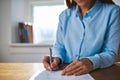 Businesswoman writing on a document Royalty Free Stock Photo