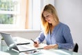 Businesswoman Writing Schedule In Diary Royalty Free Stock Photo