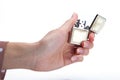 Businesswoman& x27;s hand holding lighter Royalty Free Stock Photo