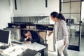 Businesswoman yelling at her employee sleeping at work Royalty Free Stock Photo