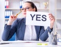 Businesswoman with yes message in office Royalty Free Stock Photo