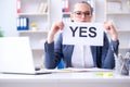 The businesswoman with yes message in office Royalty Free Stock Photo