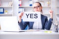 The businesswoman with yes message in office Royalty Free Stock Photo