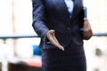 Businesswomans hand reaching