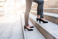 Businesswomen colleague walking upward on the stair Royalty Free Stock Photo