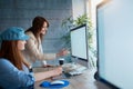 businesswomen discussing at the office-designers working on project . Royalty Free Stock Photo