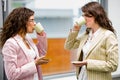 Businesswomen drinking coffee Royalty Free Stock Photo