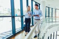 Businesswomen hold luggage travel to business trip