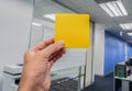 Businesswomen hold mock up posit with left hand in office