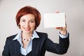 Businesswomen holding a business card