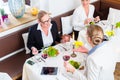 Businesswomen meeting at business dinner