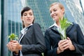 Businesswomen with Plants Royalty Free Stock Photo