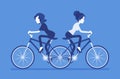 Businesswomen on push me pull you tandem bicycle