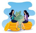 businesswomen sitting in the coins with elegant clothes