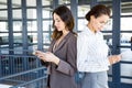 Businesswomen standing with her colleague Royalty Free Stock Photo