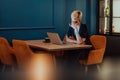 Businesswomen are stressed while working on laptop, Tired businesswoman with headache in coffee shop , feeling sick at Royalty Free Stock Photo