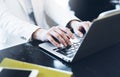 Businesswomen working in office, young hipster manager typing on keyboard, female hands texting message, work process concept