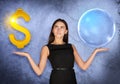 Busineswoman holding dollar sign and big bubble