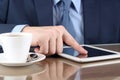 Busineswoman working with a digital table in the office