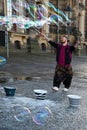 Busker makes soap bubbles in the old city of Dresden