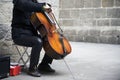 Busker playing the cello Royalty Free Stock Photo