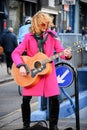 Busker playing Guitar at Portobello Road, London