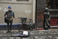 Busker singing and playing guitar near The Cavern Club nightclub birth place of the Beatles in Liverpool, England Royalty Free Stock Photo