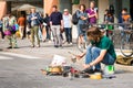 busker street artist percussionist drumming pot cooking pan to play drums Royalty Free Stock Photo