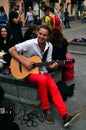 The busker (street musician) with guitar Royalty Free Stock Photo