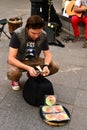The busker (street musician) with money