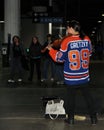 Busker wearing autographed Wayne Gretzky jersey in Toronto