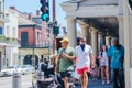 Buskers and Pedestrians Outside Cafe Du Monde in the French Quarter During the Covid-19 Pandemic Royalty Free Stock Photo