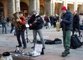 Buskers playing jazz music in the historic downtown district of Bologna. Busking on street