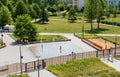 Busko-ZdrÃÂ³j, Poland - July 04, 2022: View of the spa park from the brine graduation tower. Floor fountain and playing children.