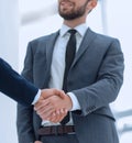 Bussines hand shaking will show succesful cooperation.