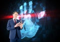 Bussines man with tablet with hand scan background Royalty Free Stock Photo
