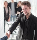 Business people shaking hands, finishing up a meeting