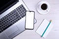 Bussines wooden office desk workplace with blank cellphone, various supplies. School, education, technology and advertisement Royalty Free Stock Photo