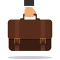 Bussiness, hand holding briefcase. The hand of a businessman holds a briefcase
