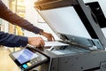 Bussiness man Hand press button on panel of printer, printer scanner laser Royalty Free Stock Photo