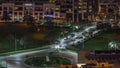 Bussy traffic on the road intersection in Dubai downtown aerial night timelapse, UAE Royalty Free Stock Photo