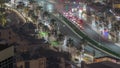Bussy traffic on the road intersection in Dubai downtown aerial night timelapse, UAE Royalty Free Stock Photo