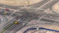 Bussy traffic on the road intersection in Dubai downtown aerial timelapse, UAE