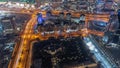 Bussy traffic on the roads and intersection in Dubai downtown aerial night timelapse. Royalty Free Stock Photo