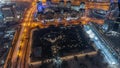 Bussy traffic on the roads and intersection in Dubai downtown aerial night timelapse. Royalty Free Stock Photo